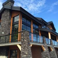 Ilaali, chalet prestigieux perché au-dessus du fleuve St-Laurent.