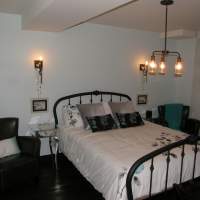 Hebergement de prestige chez Ilaali dans Charlevoix, avec charme unique dans chaque chambre.