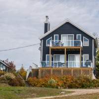 Chalet location Le Rassembleur; Petite Rivière Sant-François; Charlevoix; Versant ski Massif; Magnifique vue; Entièrement rénové; Aucun tapis.