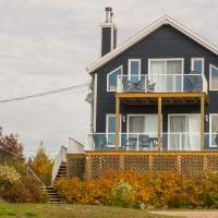 Chalet location Le Rassembleur; Petite Rivière Sant-François; Charlevoix; Versant ski Massif; Magnifique vue; Entièrement rénové; Aucun tapis.