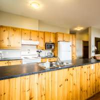 Kitchen in each condo