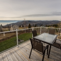 Balcon du condo avec vue sur le Massif et le fleuve